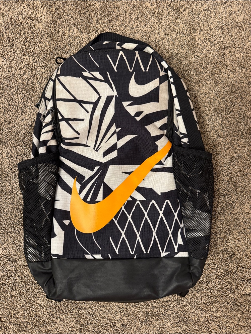 Nike Black & White Backpack with Orange Swoosh